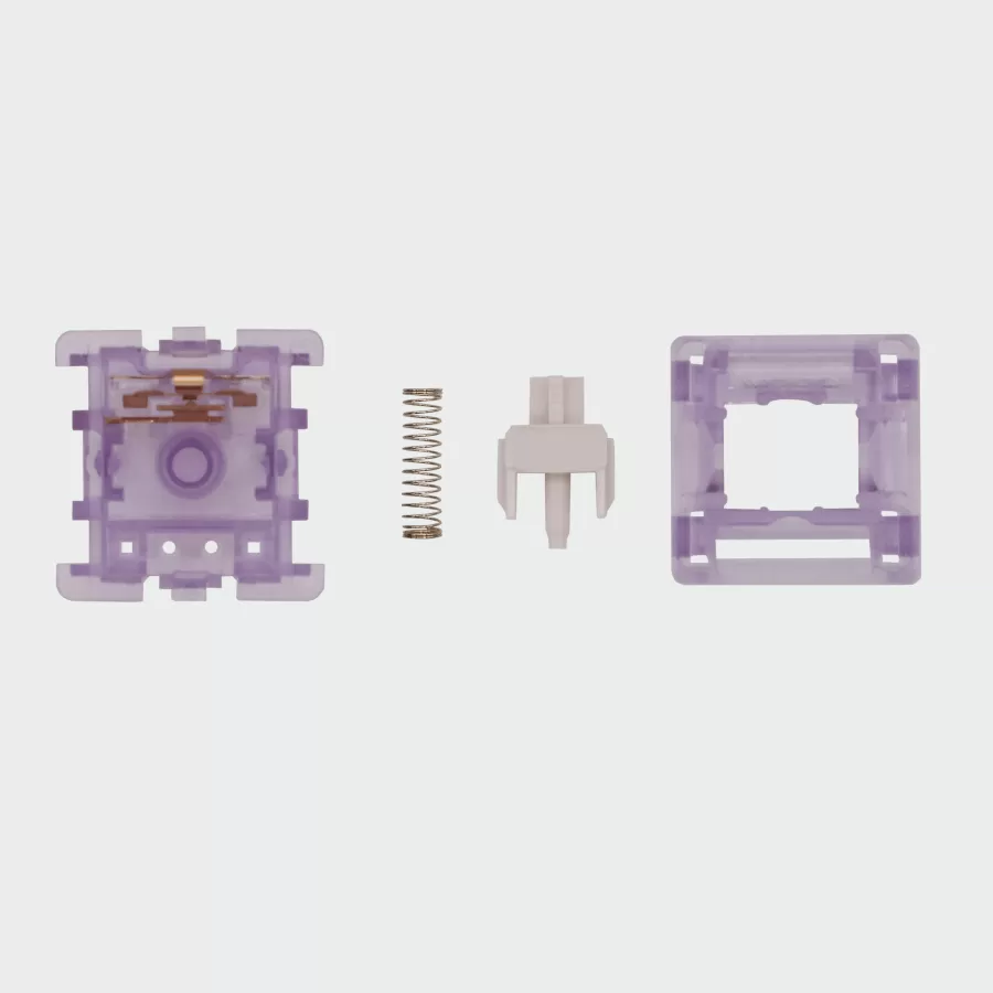 The inside of an lavender linear mechanical keyboard switch