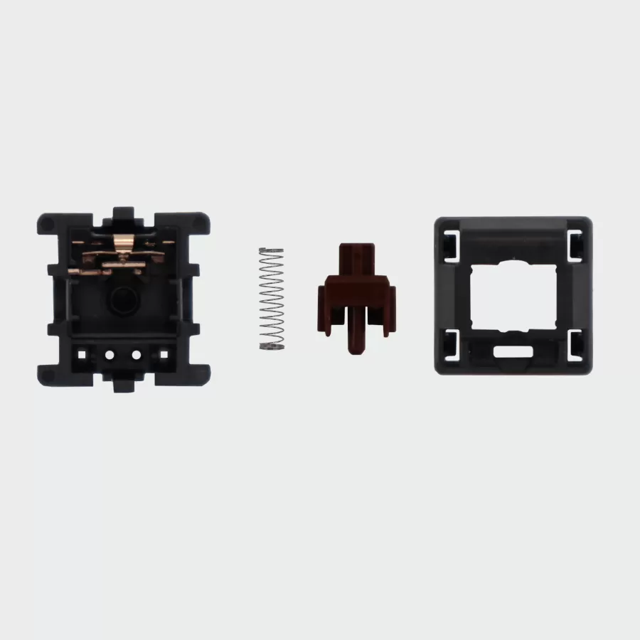 The inside of a cherry mx brown mechanical keyboard switch